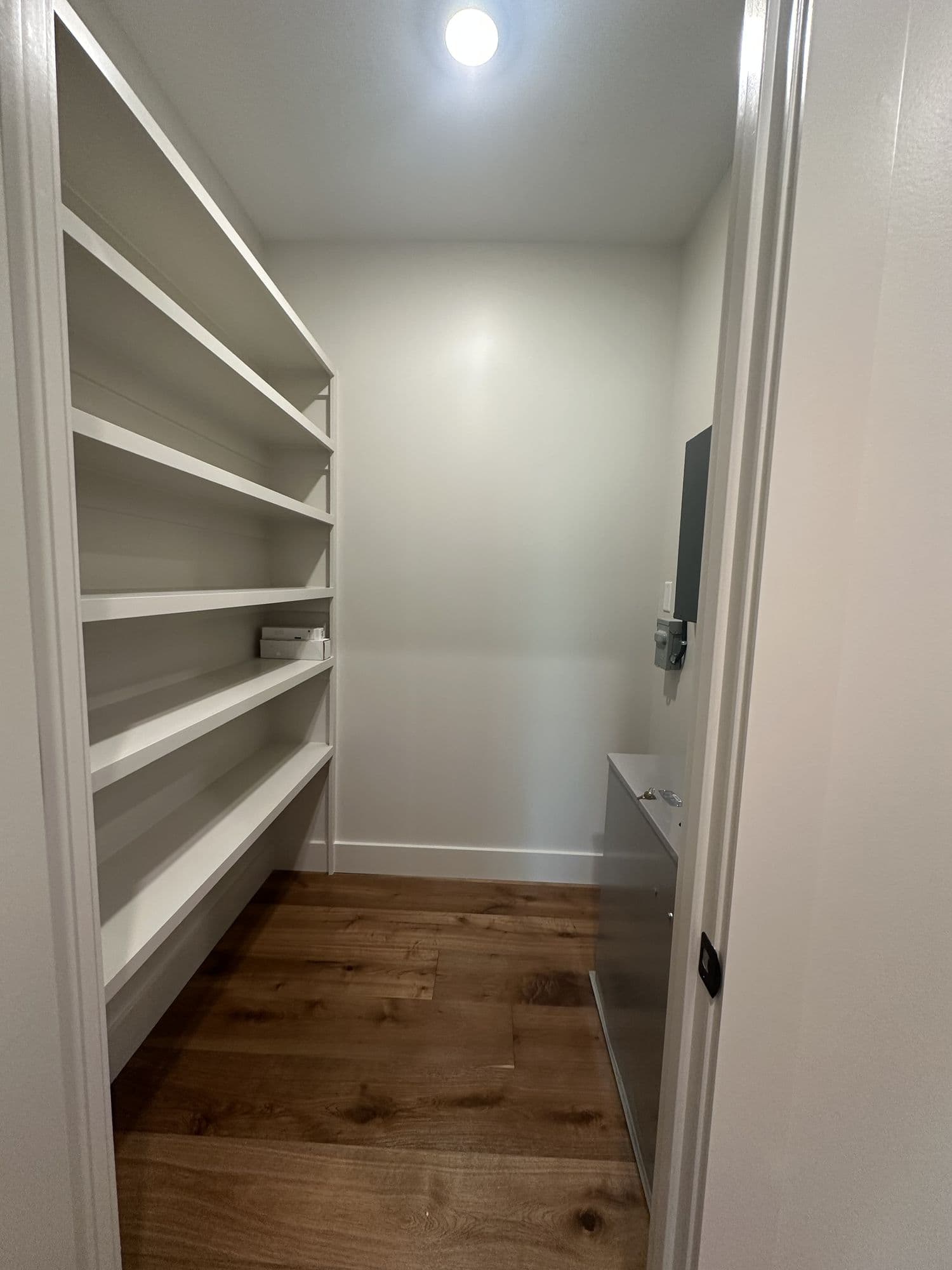 Walk-in pantry with full-height shelving